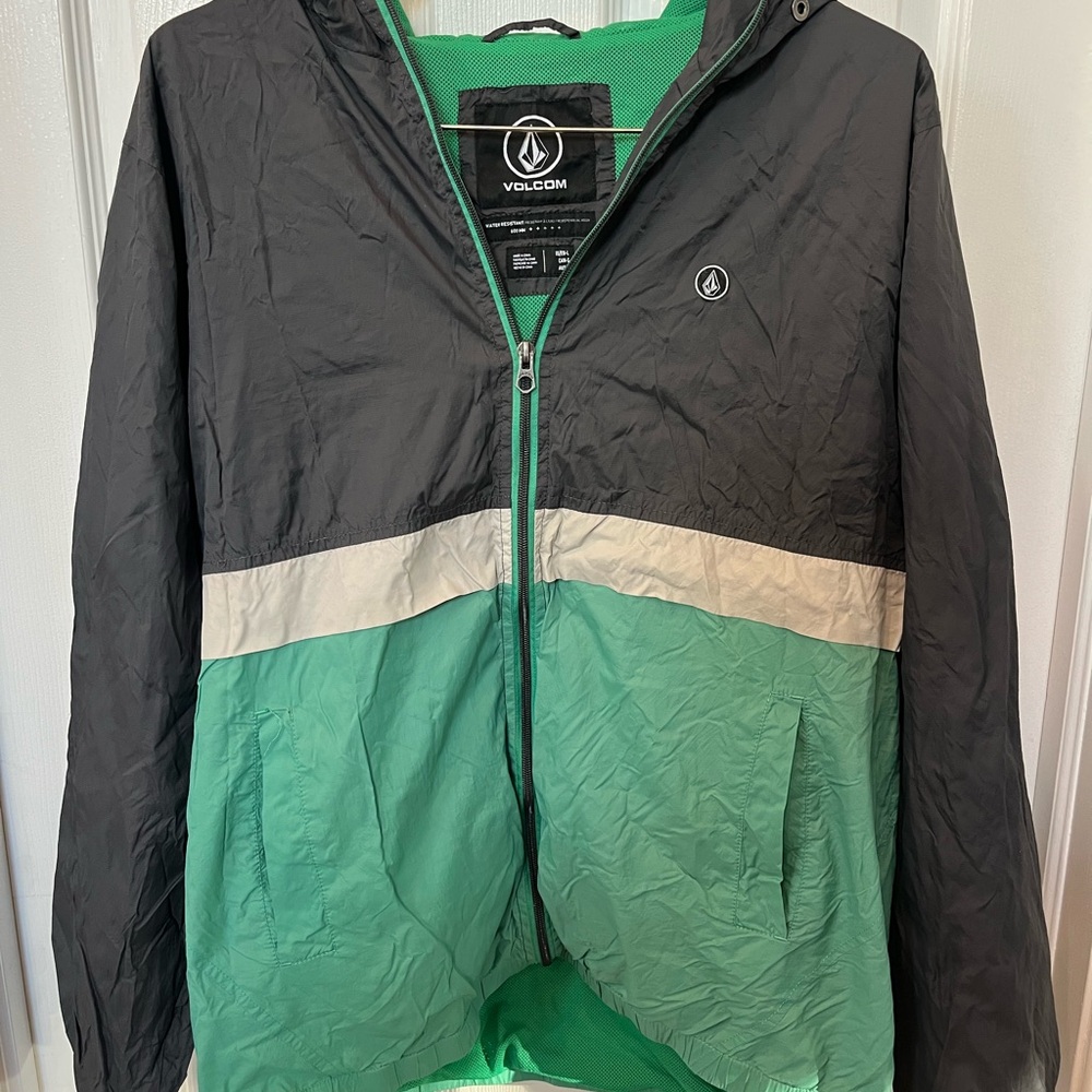 Volcom Men’s Colorblock Rain Jacket in Black, Green & Cream